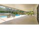 Enjoy this refreshing pool and patio area, complete with a screened enclosure for added privacy at 965 Tuskawilla Rd, Winter Springs, FL 32708