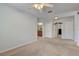 Spacious bedroom with ceiling fan and en-suite bathroom access at 2938 Daybreak Dr, Orlando, FL 32825