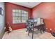 Home office with built-in desk and large window at 2938 Daybreak Dr, Orlando, FL 32825