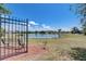 Peaceful lakefront community with a bench at 2938 Daybreak Dr, Orlando, FL 32825