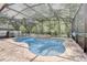 Relaxing screened-in pool and spa area at 2938 Daybreak Dr, Orlando, FL 32825