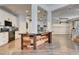 Updated kitchen featuring white cabinets, granite countertops, and a farmhouse island at 2938 Daybreak Dr, Orlando, FL 32825