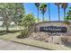 The Villages community entrance sign near a lake at 2938 Daybreak Dr, Orlando, FL 32825