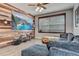 Relaxing living room with large sectional sofa and rustic wall decor at 2938 Daybreak Dr, Orlando, FL 32825
