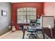 Home office with built-in desk and large window at 2938 Daybreak Dr, Orlando, FL 32825