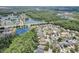 Community view with houses, lake and conservation at 2938 Daybreak Dr, Orlando, FL 32825