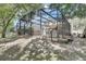 Backyard view of screened-in pool and spa at 2938 Daybreak Dr, Orlando, FL 32825