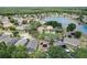 Community view with houses, lake and conservation at 2938 Daybreak Dr, Orlando, FL 32825