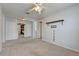 Bright bedroom with ceiling fan and built-in shelving at 2938 Daybreak Dr, Orlando, FL 32825