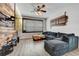 Relaxing living room with large sectional sofa and rustic wall decor at 2938 Daybreak Dr, Orlando, FL 32825