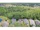 Community view with houses, lake and conservation at 2938 Daybreak Dr, Orlando, FL 32825
