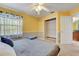 Bright bedroom with ceiling fan and ample closet space at 2938 Daybreak Dr, Orlando, FL 32825