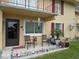Inviting front patio with seating and landscaping at 933 W Oak Ridge Rd # 933 B, Orlando, FL 32809