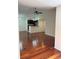 Open living space with hardwood floors and kitchen view at 5132 Conroy Rd # 937, Orlando, FL 32811