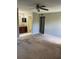 Main bedroom with ceiling fan and carpeted floors at 5132 Conroy Rd # 937, Orlando, FL 32811