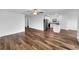 Open living room with wood-look flooring at 4305 Carrabelle River Ln, Lakeland, FL 33811
