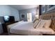 King-size bed with access to a private bathroom at 2965 Fable St, Kissimmee, FL 34746