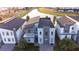 Modern home with a view of the lake and community at 2965 Fable St, Kissimmee, FL 34746