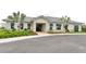 Community clubhouse with welcoming exterior and landscaping at 2965 Fable St, Kissimmee, FL 34746