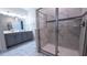 Modern bathroom with double vanity and large shower at 2965 Fable St, Kissimmee, FL 34746