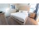 King-size bed with upholstered headboard in a bedroom at 2965 Fable St, Kissimmee, FL 34746