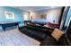Basement recreation room includes a pool table, sectional sofa, and foosball table at 2965 Fable St, Kissimmee, FL 34746
