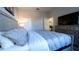Bright bedroom with a king-size bed and large TV at 2965 Fable St, Kissimmee, FL 34746