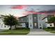 Modern home with stone accents in a row of similar houses at 2965 Fable St, Kissimmee, FL 34746