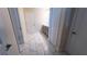 Clean bathroom with modern vanity and elegant tile flooring at 2965 Fable St, Kissimmee, FL 34746
