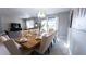Bright dining room with a large table, perfect for entertaining at 2965 Fable St, Kissimmee, FL 34746