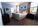 Spacious bedroom with king-size bed and en-suite bathroom at 2965 Fable St, Kissimmee, FL 34746