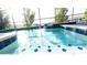 Relaxing spa with waterfall feature and screened enclosure at 2965 Fable St, Kissimmee, FL 34746