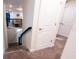 Staircase leading to the upper level with a view of the living area at 2965 Fable St, Kissimmee, FL 34746