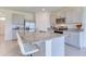 Modern kitchen with granite countertop and island at 418 Anne St, Deland, FL 32724