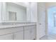 Double vanity bathroom with granite countertop at 418 Anne St, Deland, FL 32724