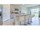 Modern kitchen with island and stainless steel appliances at 418 Anne St, Deland, FL 32724