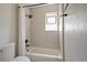 Updated bathroom with tub shower and neutral tile at 59 Chippingwood Ln, Ormond Beach, FL 32176