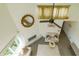 Open living area with fireplace, seating, and high ceilings at 59 Chippingwood Ln, Ormond Beach, FL 32176