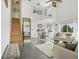 Bright living room with high ceilings, loft, and modern furniture at 59 Chippingwood Ln, Ormond Beach, FL 32176