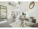 Open living area with fireplace and plenty of natural light at 59 Chippingwood Ln, Ormond Beach, FL 32176