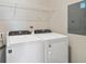 Laundry room with Whirlpool washer and dryer at 7557 Laureate Blvd # 6208, Orlando, FL 32827