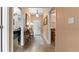 Bright hallway with decorative console table at 6312 Buford St # 303, Orlando, FL 32835