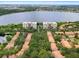 Two condo buildings overlooking a tranquil lake at 6312 Buford St # 303, Orlando, FL 32835