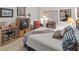Bedroom with comfortable bed and armchair at 6312 Buford St # 303, Orlando, FL 32835