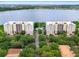 Two lakefront condo buildings with lush surroundings at 6312 Buford St # 303, Orlando, FL 32835