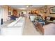 Spacious living room with ample seating and large windows at 6312 Buford St # 303, Orlando, FL 32835