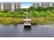 Private dock with access to a serene lake at 6312 Buford St # 303, Orlando, FL 32835