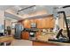 Well-equipped kitchen featuring stainless steel appliances and granite countertops at 6312 Buford St # 303, Orlando, FL 32835