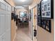 Hallway with dining area and Gathering photos at 6312 Buford St # 303, Orlando, FL 32835