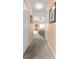 Hallway view of bedroom and access to other rooms at 6312 Buford St # 303, Orlando, FL 32835